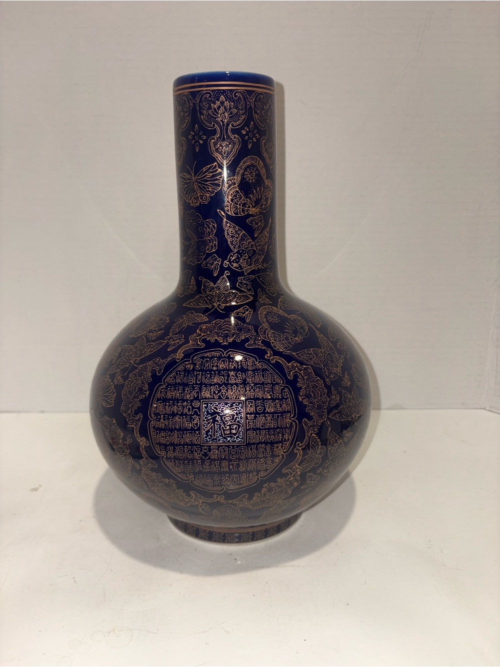 Decorative Blue and Gold Porcelain Vase - Elegant Floral Design - Vintage